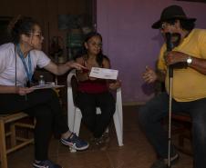 Equipes do Estado percorrem Rio Bonito do Iguaçu para entregar Cartões Reconstrução às famílias